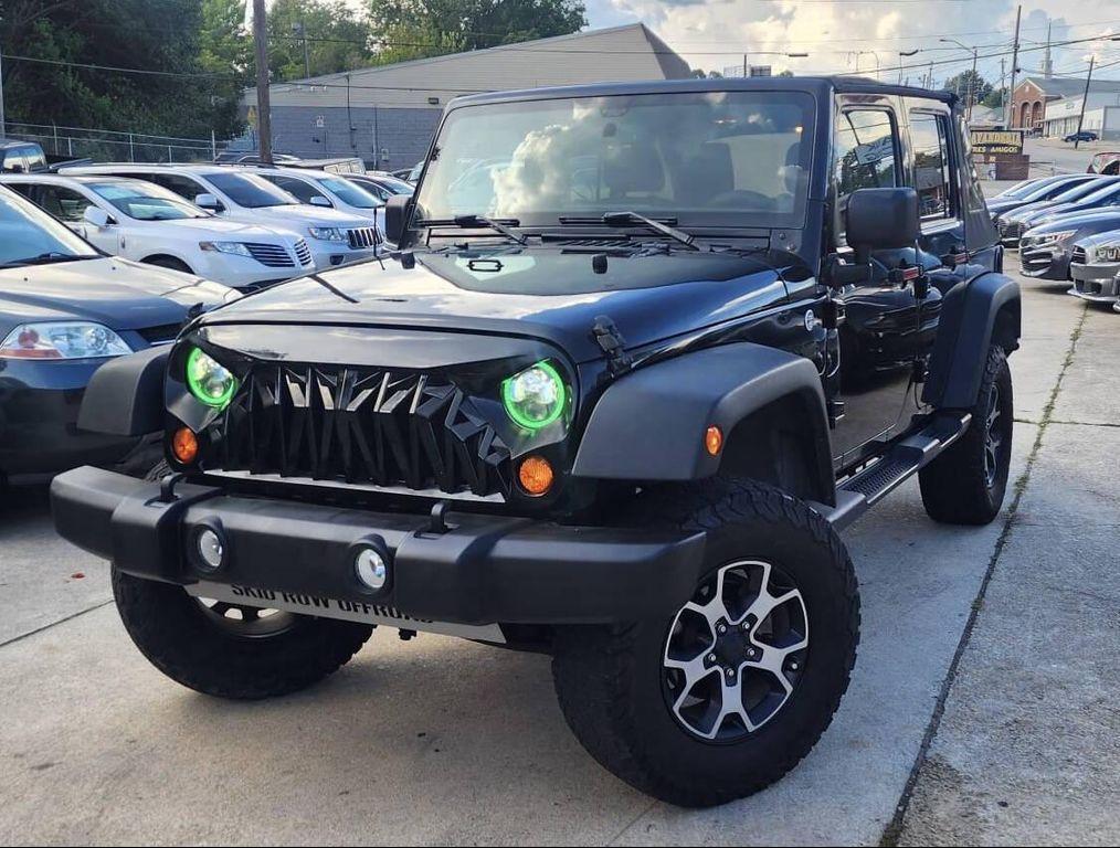 used 2013 Jeep Wrangler Unlimited car, priced at $14,798