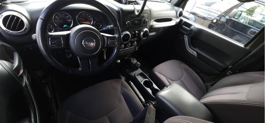 used 2015 Jeep Wrangler Unlimited car, priced at $18,498