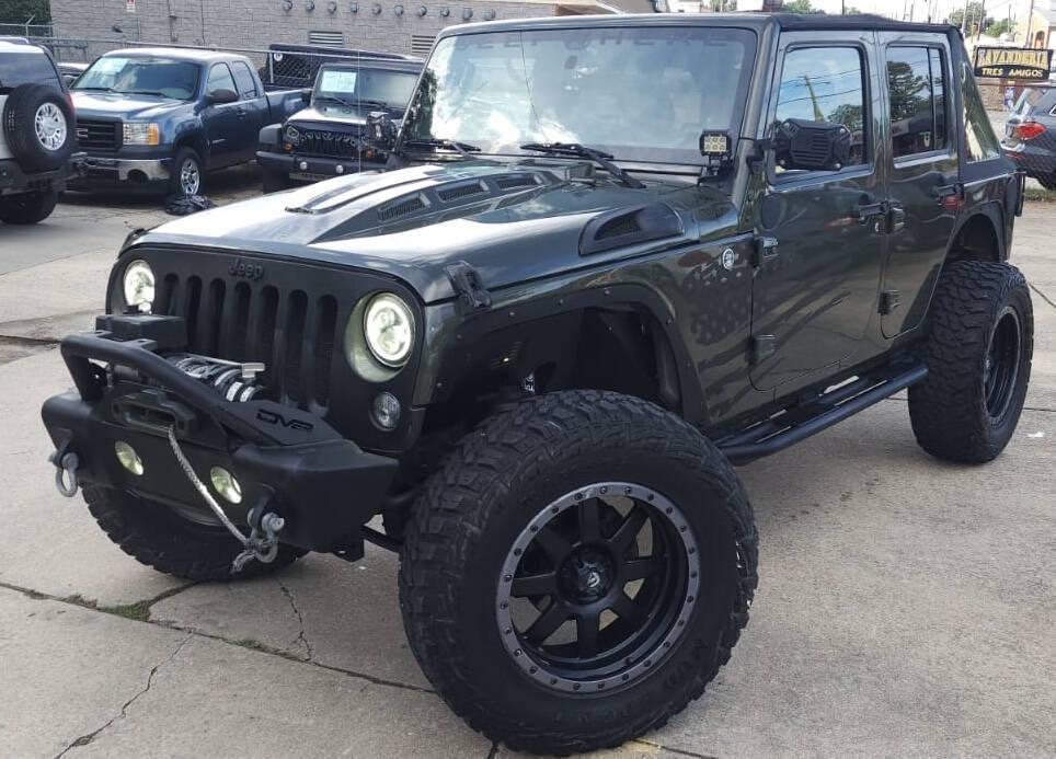 used 2015 Jeep Wrangler Unlimited car, priced at $18,498