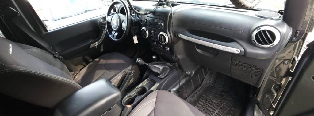 used 2015 Jeep Wrangler Unlimited car, priced at $18,498