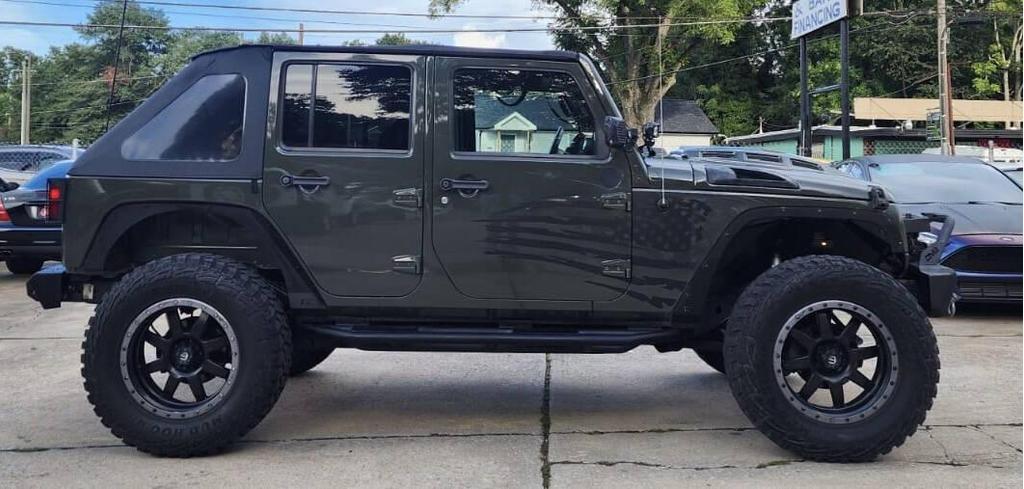 used 2015 Jeep Wrangler Unlimited car, priced at $18,498