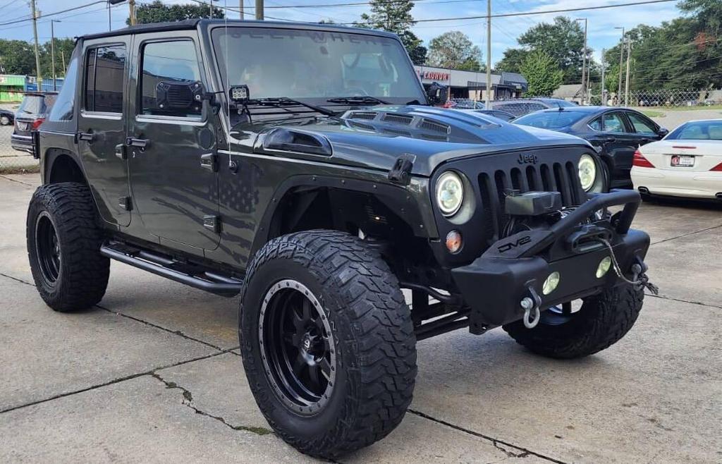 used 2015 Jeep Wrangler Unlimited car, priced at $18,498