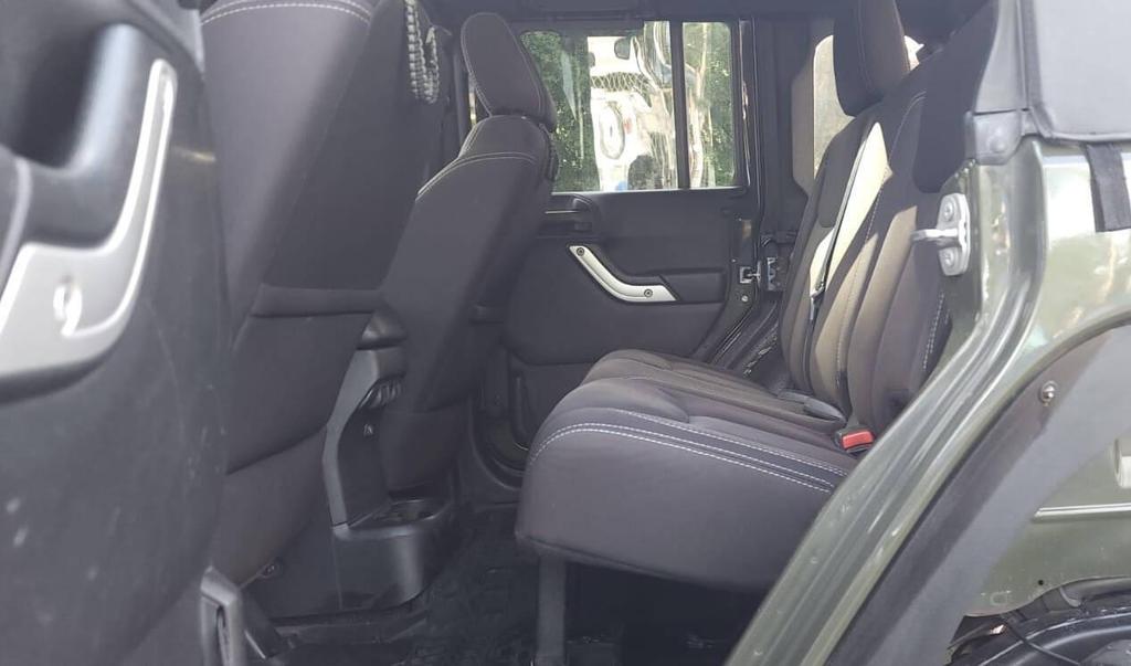 used 2015 Jeep Wrangler Unlimited car, priced at $18,498