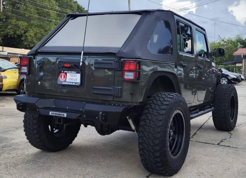 used 2015 Jeep Wrangler Unlimited car, priced at $18,498