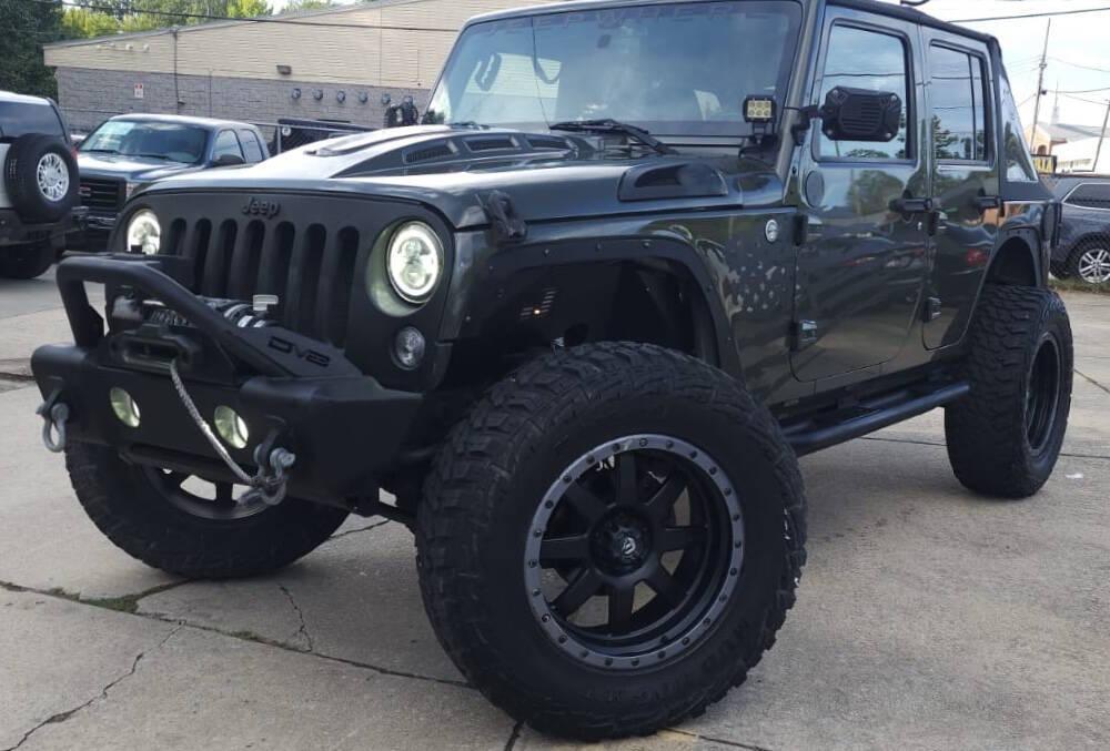 used 2015 Jeep Wrangler Unlimited car, priced at $18,498