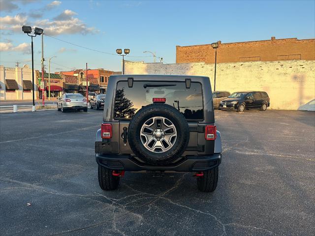 used 2016 Jeep Wrangler Unlimited car, priced at $28,595