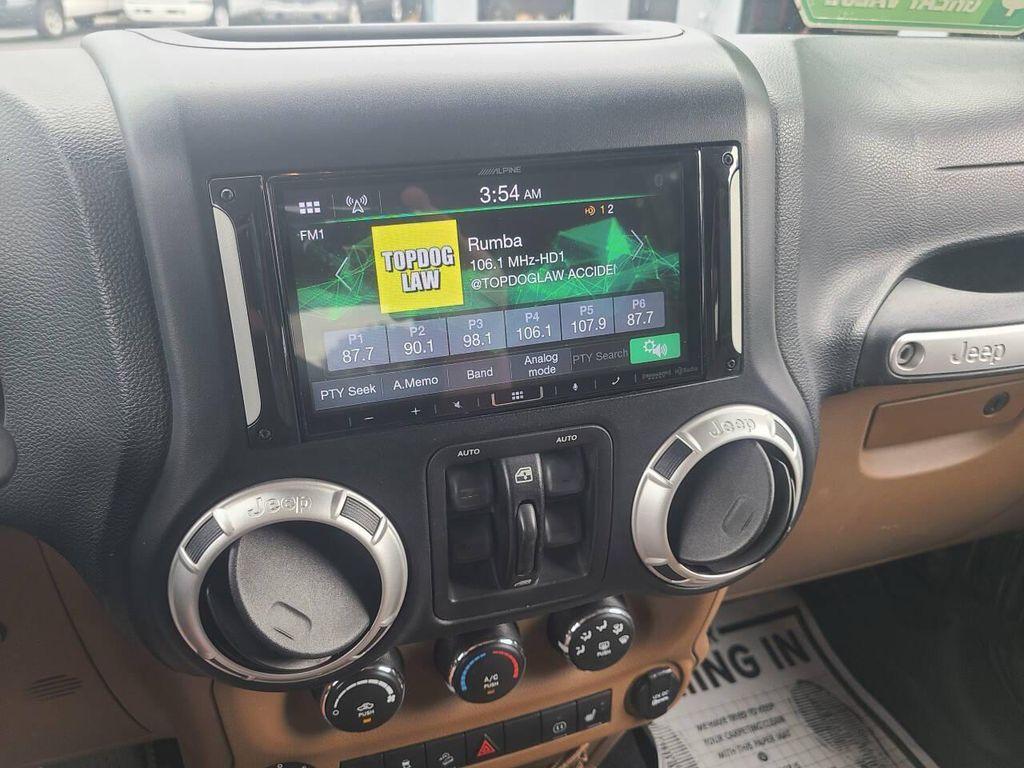 used 2012 Jeep Wrangler Unlimited car, priced at $16,595