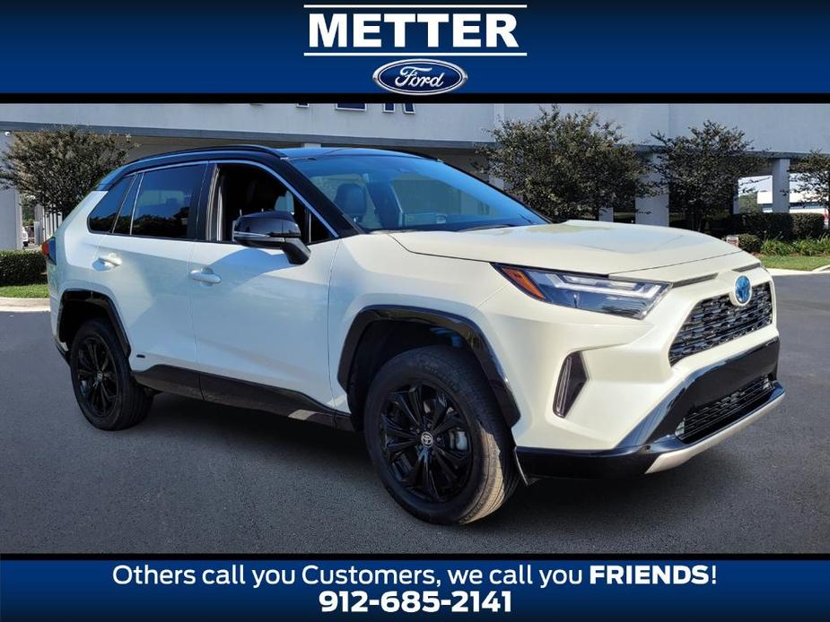 used 2022 Toyota RAV4 Hybrid car, priced at $34,299