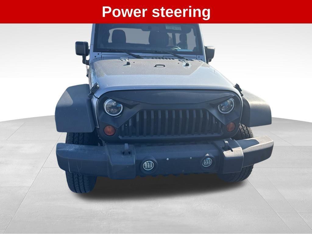 used 2013 Jeep Wrangler Unlimited car, priced at $13,653