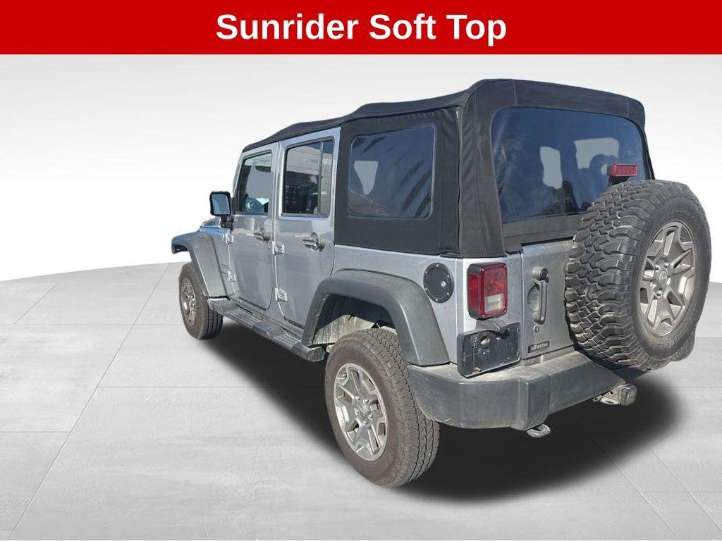 used 2013 Jeep Wrangler Unlimited car, priced at $13,653