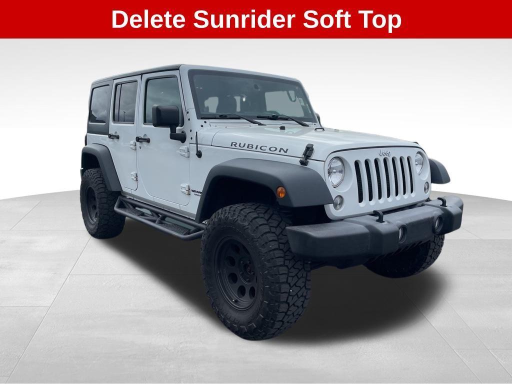 used 2016 Jeep Wrangler Unlimited car, priced at $18,540