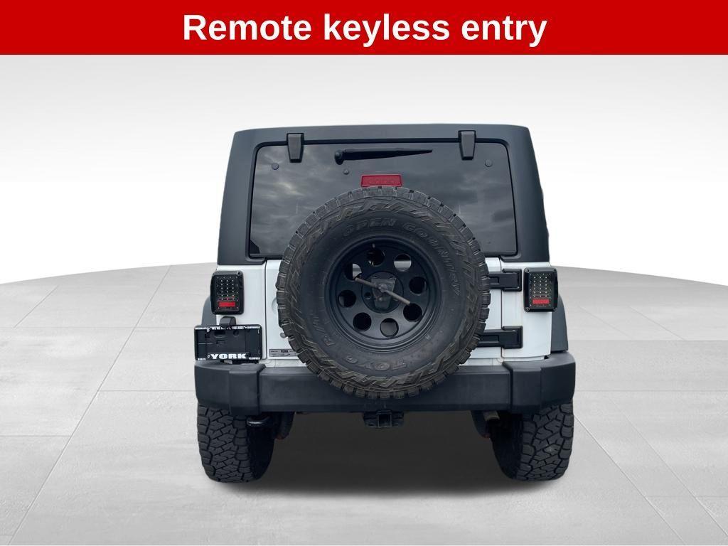 used 2016 Jeep Wrangler Unlimited car, priced at $18,540