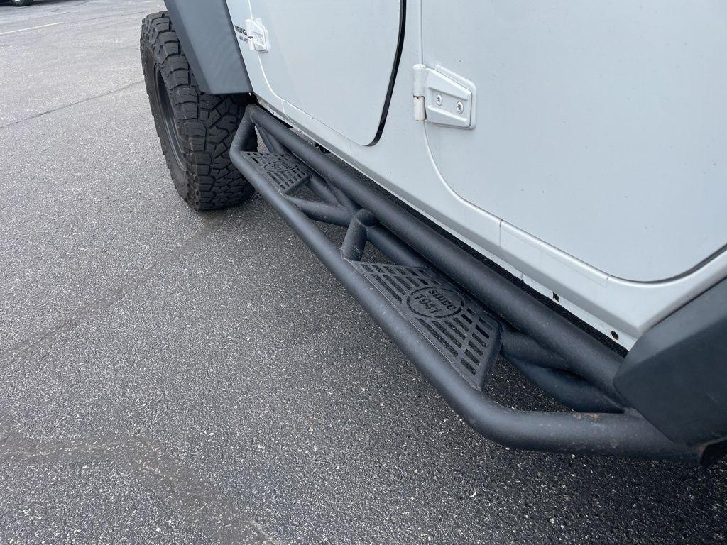 used 2016 Jeep Wrangler Unlimited car, priced at $18,540
