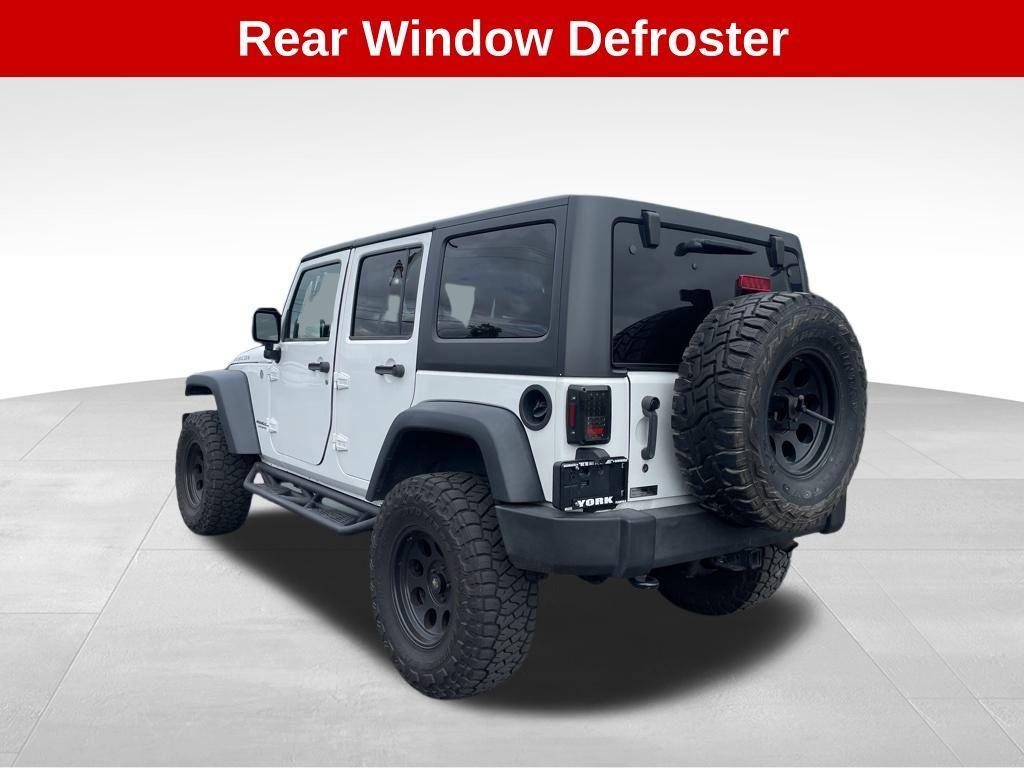 used 2016 Jeep Wrangler Unlimited car, priced at $18,540