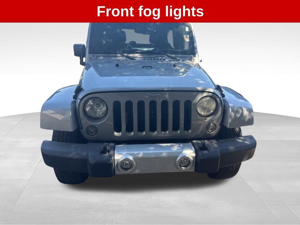 used 2015 Jeep Wrangler Unlimited car, priced at $18,534