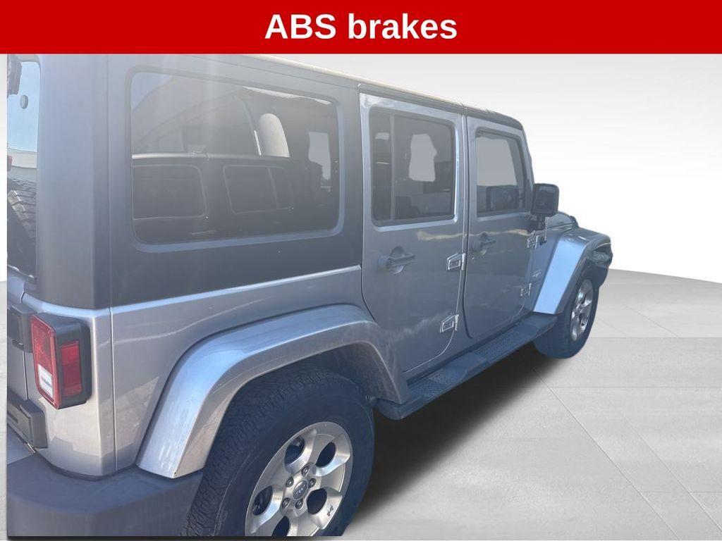 used 2015 Jeep Wrangler Unlimited car, priced at $18,534