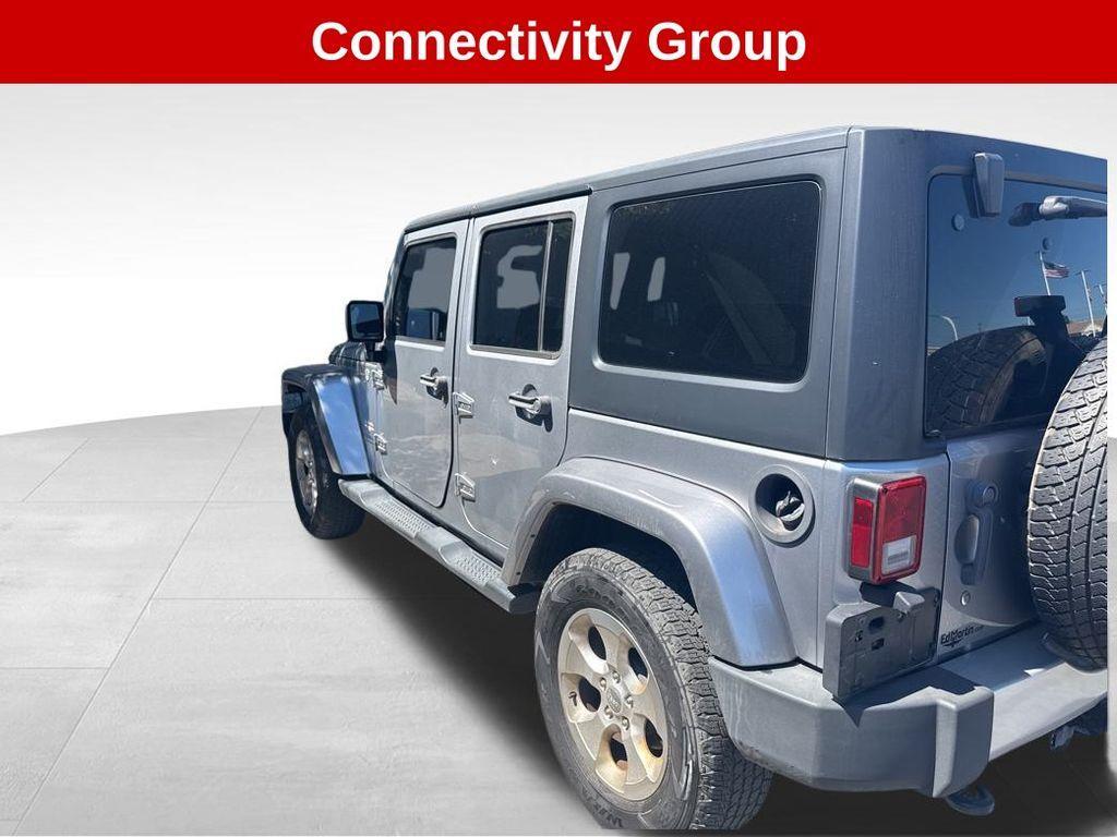 used 2015 Jeep Wrangler Unlimited car, priced at $18,534