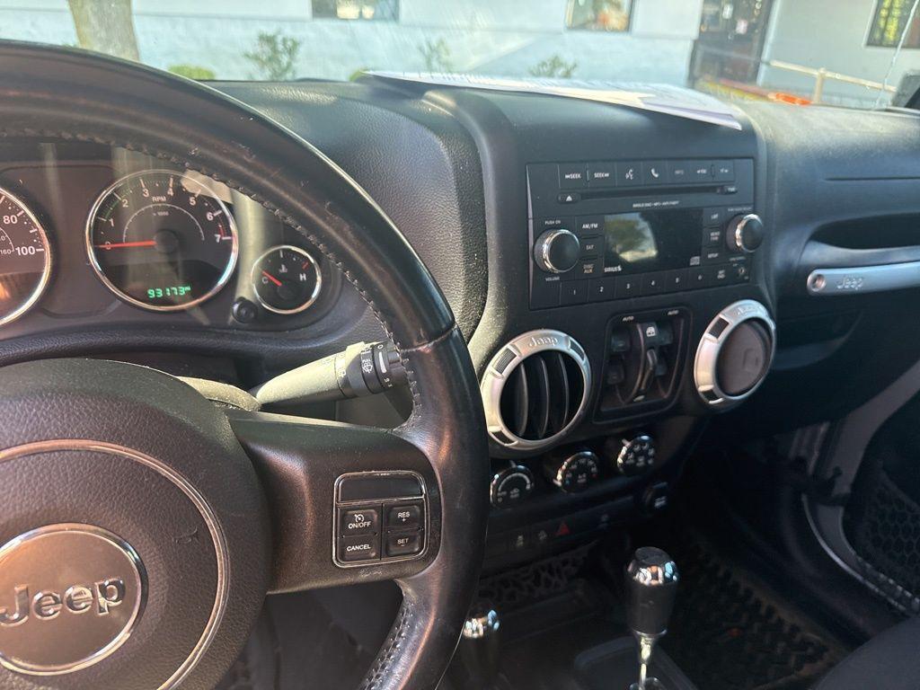 used 2015 Jeep Wrangler Unlimited car, priced at $18,534