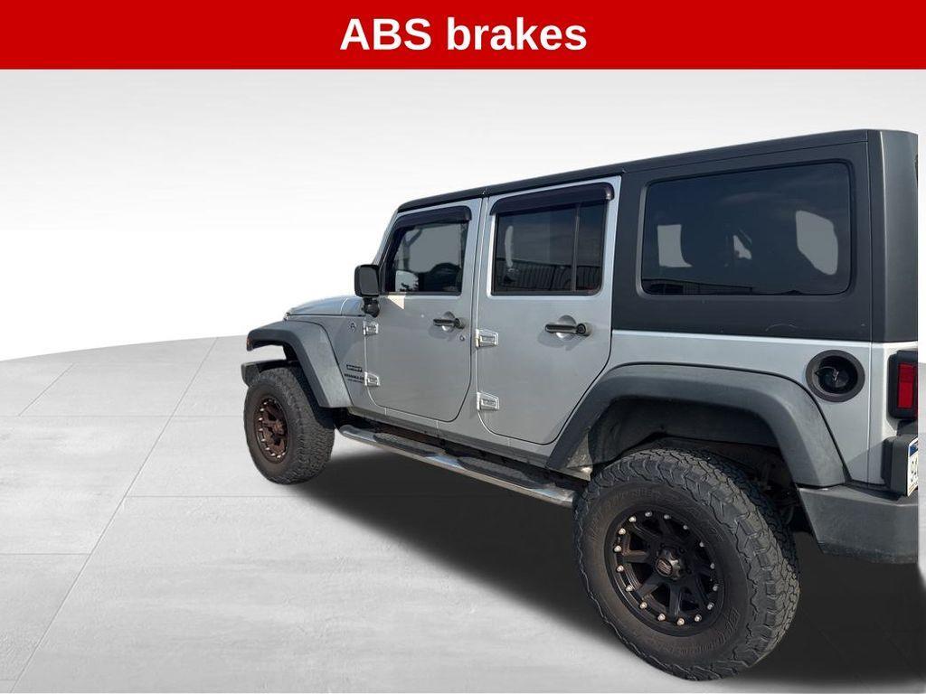 used 2012 Jeep Wrangler Unlimited car, priced at $11,994