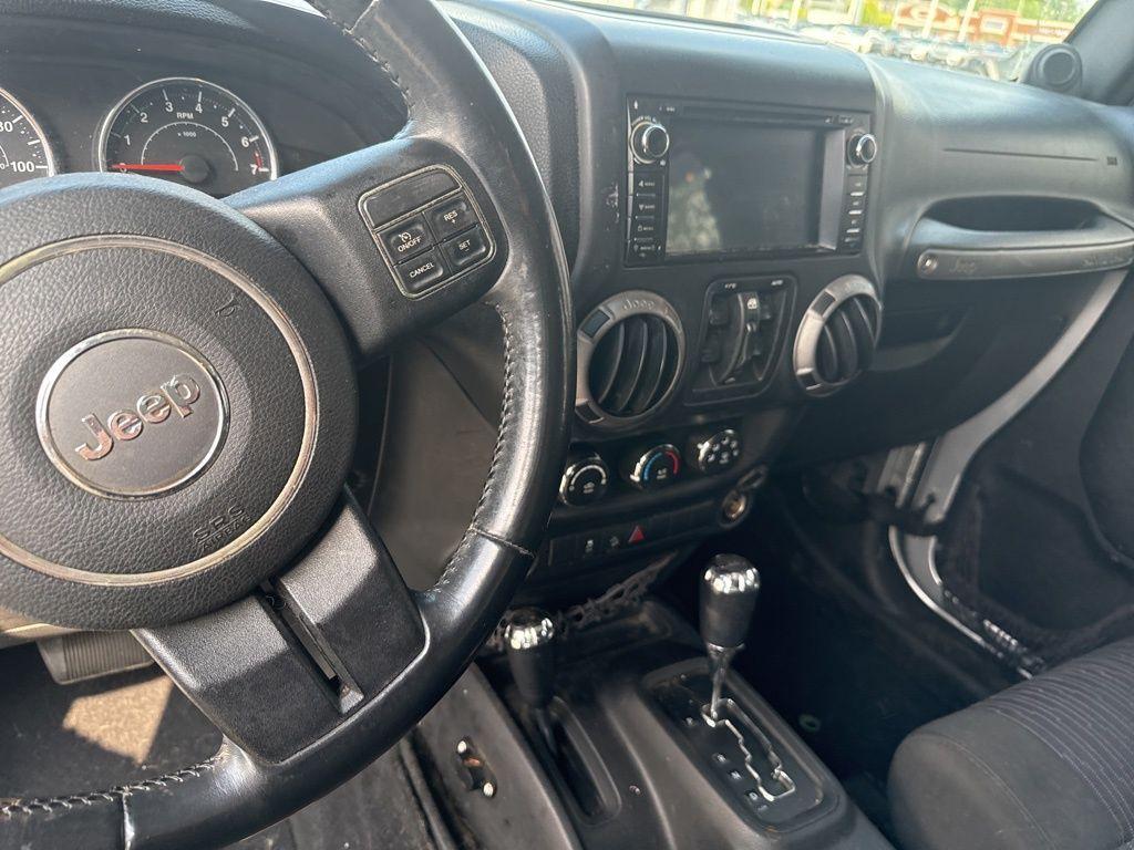 used 2012 Jeep Wrangler Unlimited car, priced at $11,994