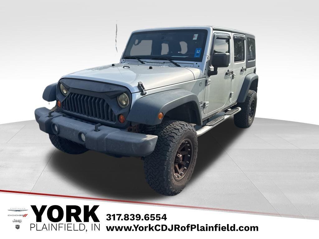 used 2012 Jeep Wrangler Unlimited car, priced at $11,994