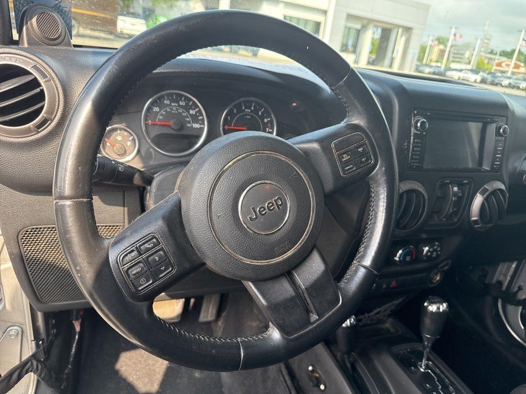used 2012 Jeep Wrangler Unlimited car, priced at $11,994