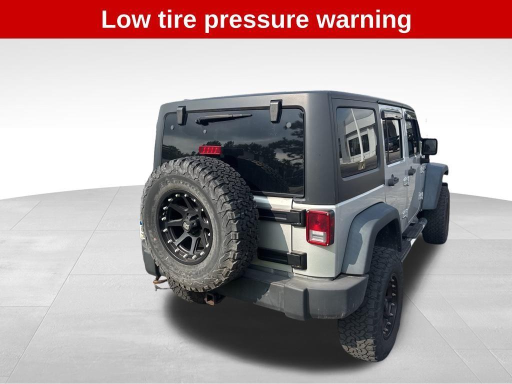 used 2012 Jeep Wrangler Unlimited car, priced at $11,994