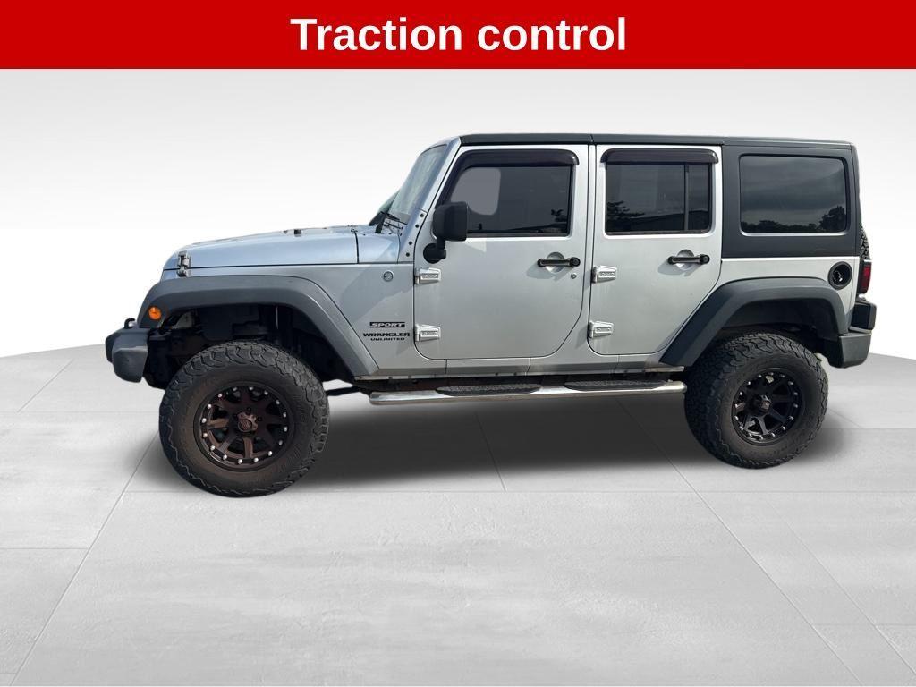 used 2012 Jeep Wrangler Unlimited car, priced at $11,994