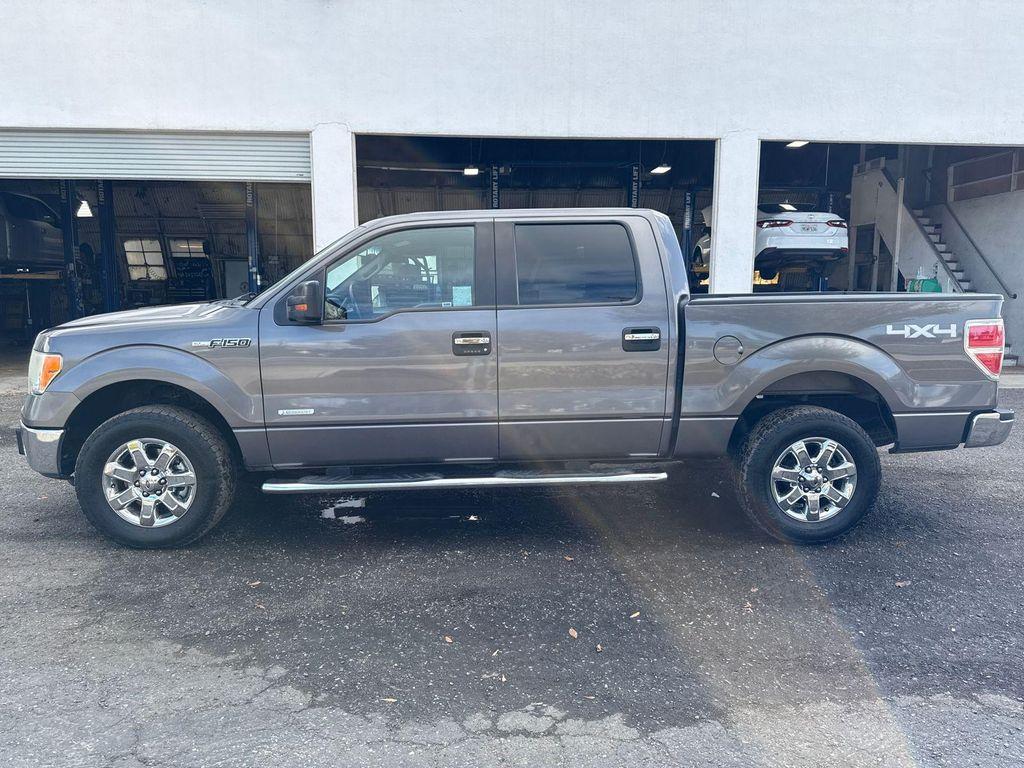 used 2013 Ford F-150 car, priced at $10,000