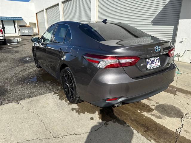 used 2019 Toyota Camry Hybrid car, priced at $22,458
