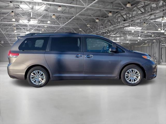 used 2014 Toyota Sienna car, priced at $15,000