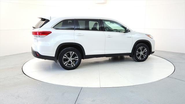 used 2019 Toyota Highlander Hybrid car, priced at $25,595