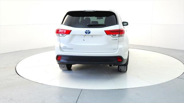 used 2019 Toyota Highlander Hybrid car, priced at $25,595