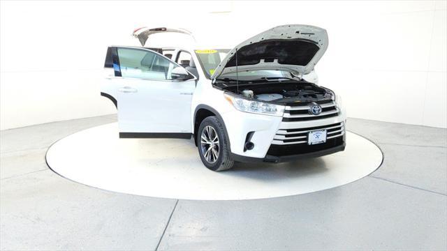 used 2019 Toyota Highlander Hybrid car, priced at $25,595