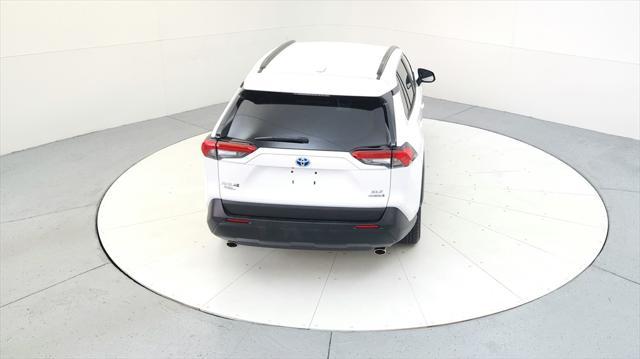 used 2021 Toyota RAV4 Hybrid car, priced at $28,595