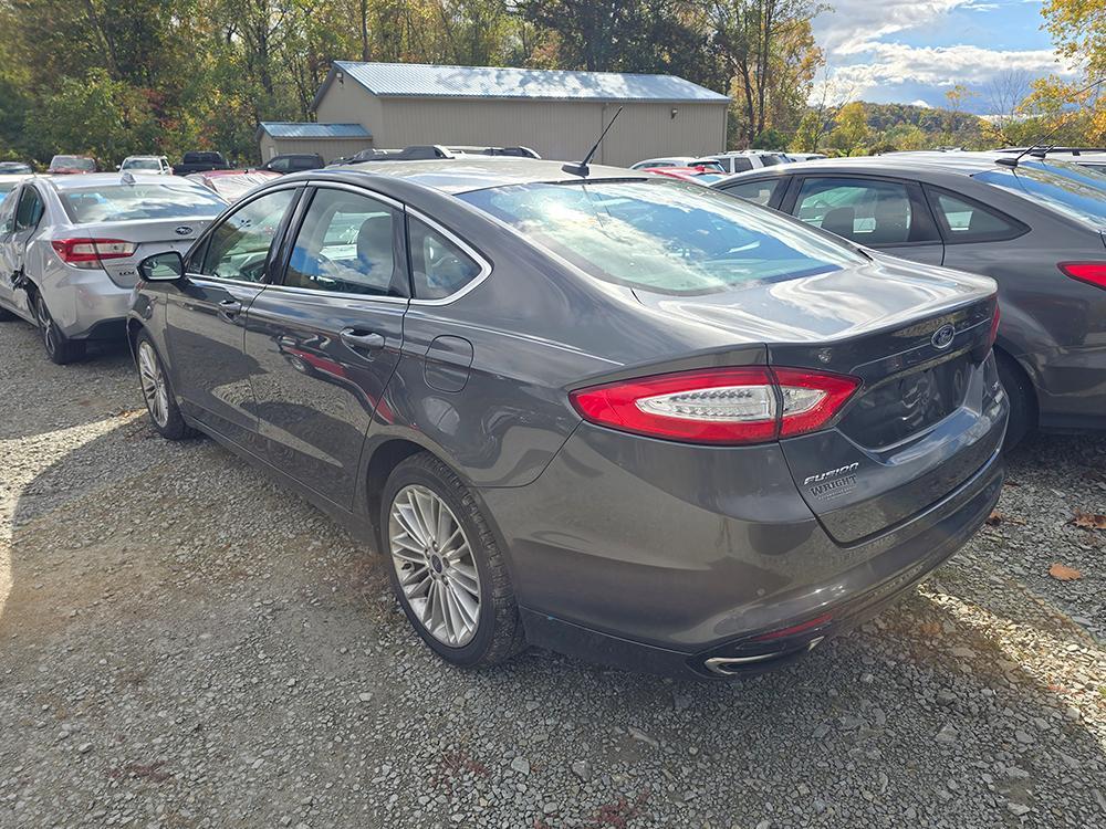 used 2016 Ford Fusion car, priced at $6,500