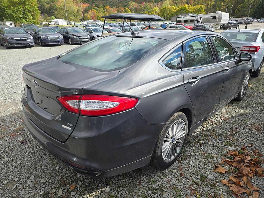 used 2016 Ford Fusion car, priced at $6,500