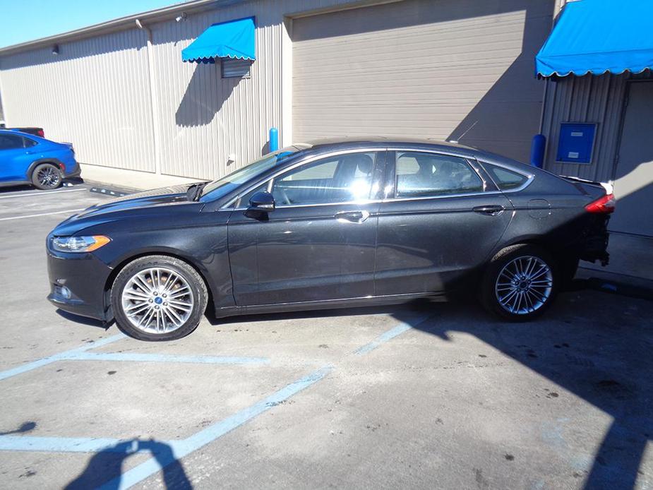 used 2015 Ford Fusion car, priced at $7,000