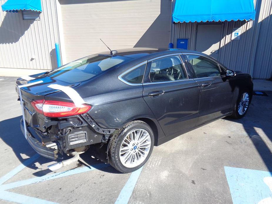 used 2015 Ford Fusion car, priced at $7,000