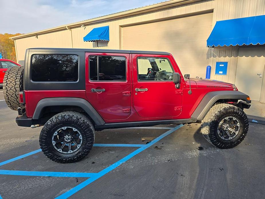 used 2011 Jeep Wrangler Unlimited car, priced at $21,900