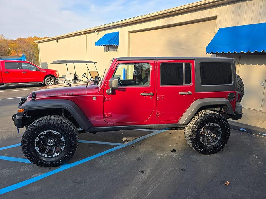 used 2011 Jeep Wrangler Unlimited car, priced at $21,900