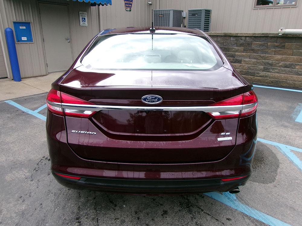 used 2018 Ford Fusion car, priced at $12,000