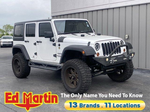 used 2012 Jeep Wrangler Unlimited car, priced at $15,497