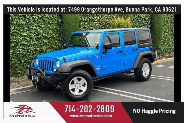 used 2011 Jeep Wrangler Unlimited car, priced at $14,995