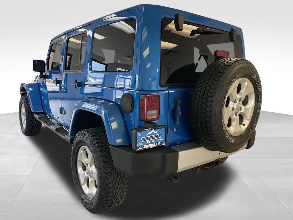 used 2014 Jeep Wrangler Unlimited car, priced at $21,997