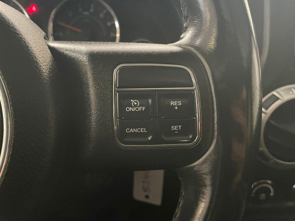 used 2014 Jeep Wrangler Unlimited car, priced at $21,997