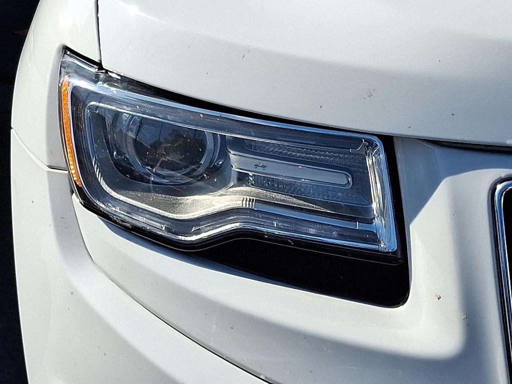 used 2014 Jeep Grand Cherokee car, priced at $10,634