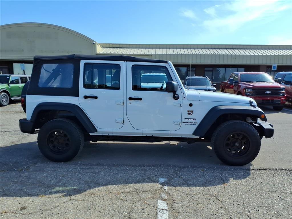 used 2014 Jeep Wrangler Unlimited car, priced at $14,449