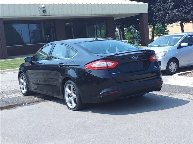 used 2013 Ford Fusion car, priced at $6,998