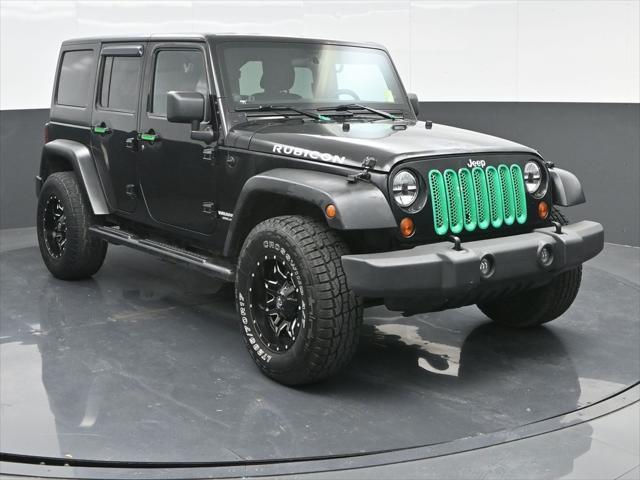 used 2012 Jeep Wrangler Unlimited car, priced at $10,900